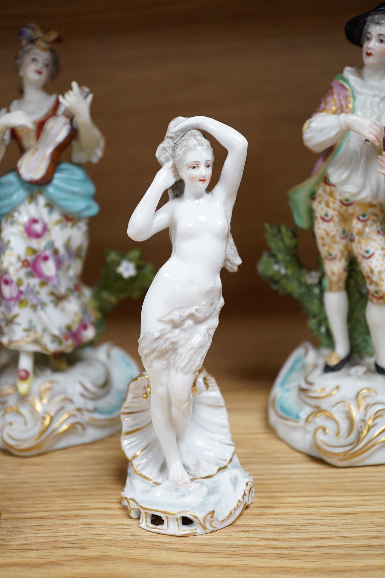 A Meissen seated figure emblematic of sense of smell, and three pairs of Continental porcelain figures, (7) tallest 19cm.
